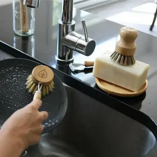 Eco-friendly cleaning service showing professional cleaner using non-toxic products to sanitize a modern home safely for kids and pets