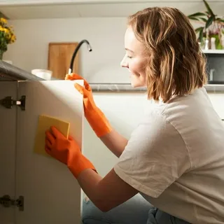 Professional deep cleaning service in North Carolina, showing team cleaning kitchen, bathroom, and living areas